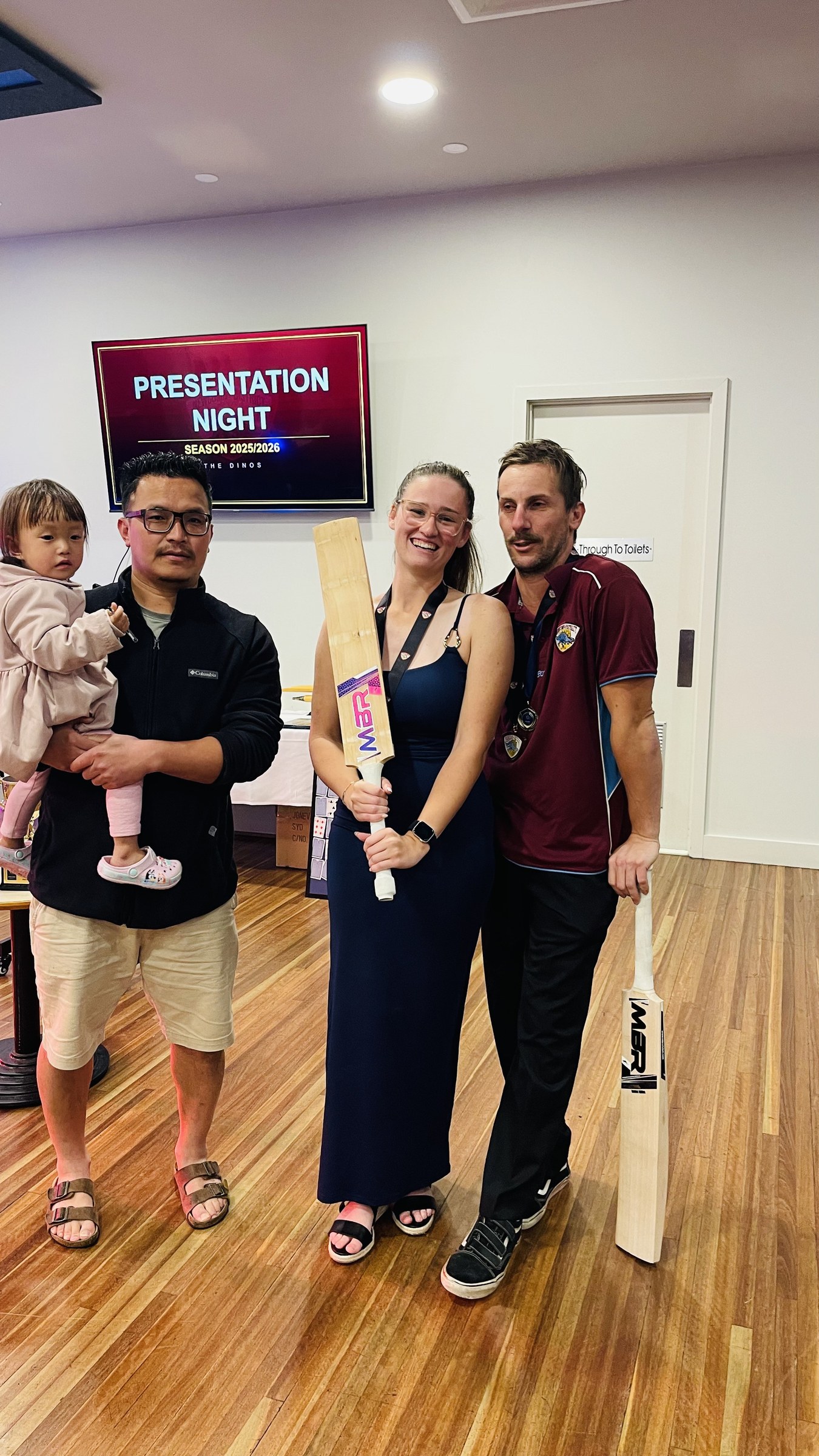 Award recipients holding trophies during the club presentation night.